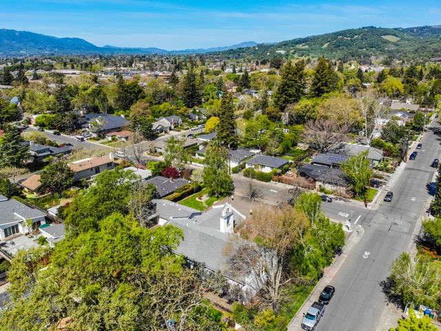 Aerial view of Sonoma Valley Community Church among the trees and homes of Sonoma