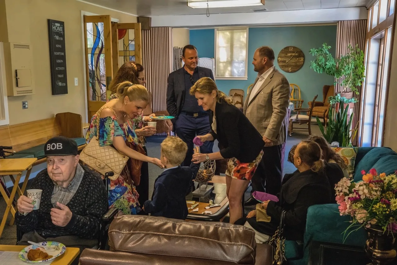 Coffee hour conversation with church members of all ages in the fellowship room